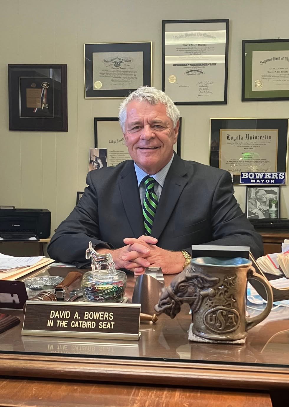 David Bowers at his desk in his Roanoke law office, beside a nameplate reading David A. Bowers, In the Catbird Seat